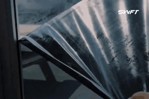 Animated clip showing a technician carefully applying and smoothing residential window tint film during the installation process, highlighting the precision and care involved in Fort Myers Tint’s residential window tinting installation process.